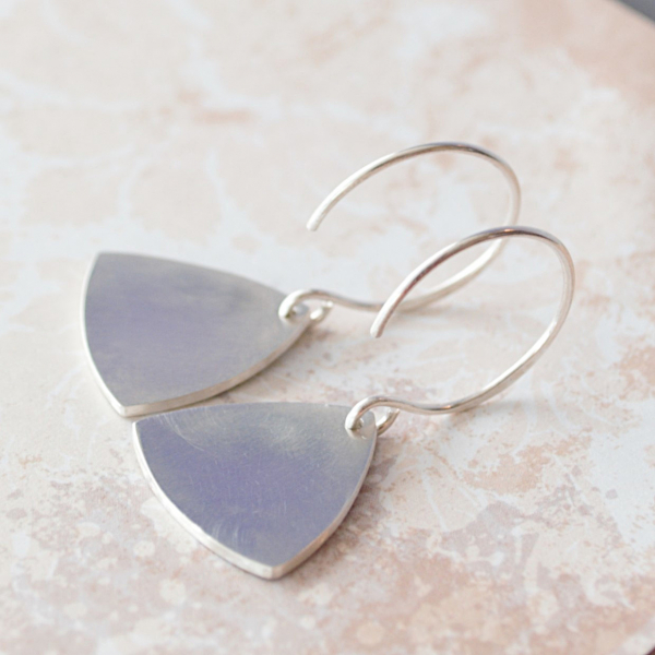 Sterling earrings  Rounded triangles formed in a convex shape  Sandpaper finish
