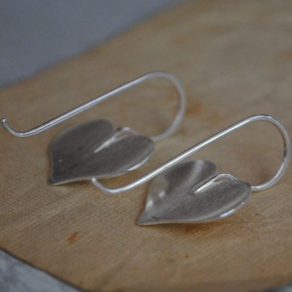 Sterling heart earrings in a cute whimsical shape The ear wires are soldered dir