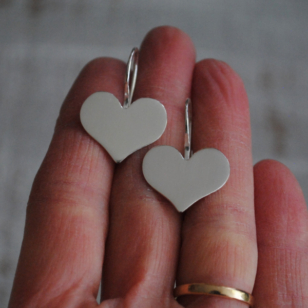 Sterling heart earrings in a cute whimsical shape The ear wires are soldered dir