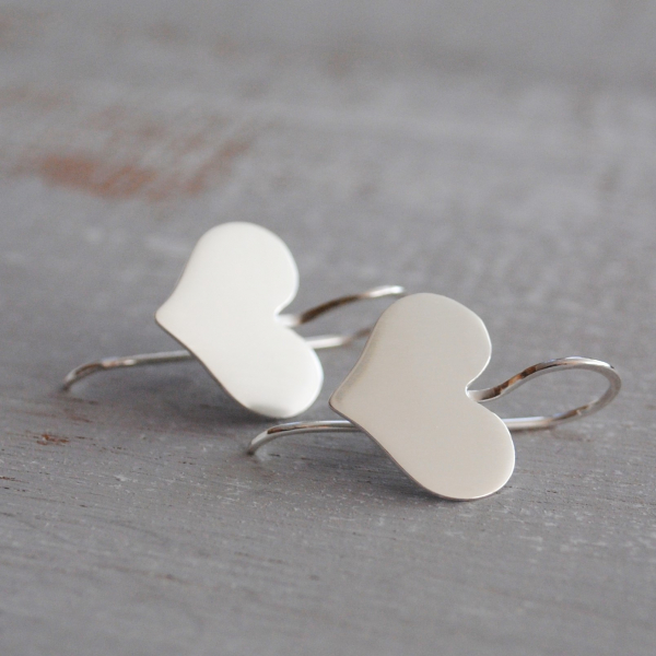 Sterling heart earrings in a cute whimsical shape The ear wires are soldered dir