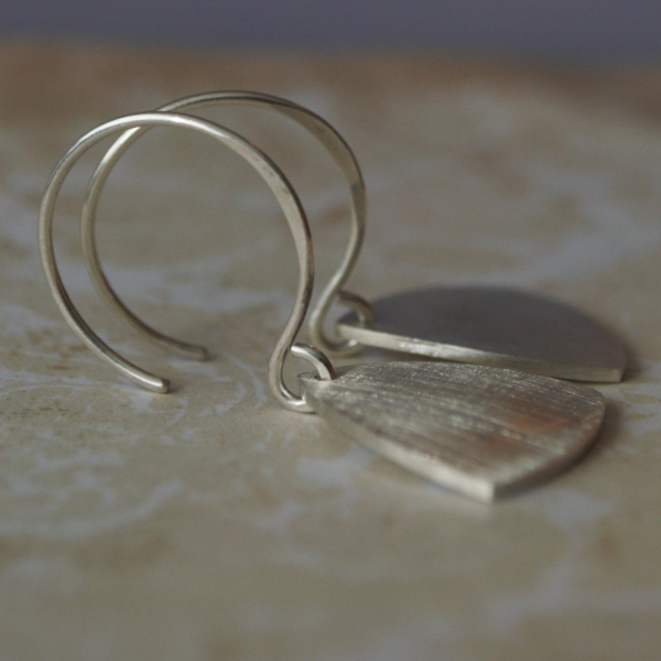Sterling earrings  Rounded triangles formed in a convex shape  Sandpaper finish